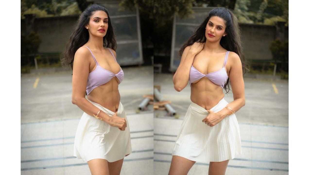 Manmeet kaur chubby cleavage exposed in white bikini top..