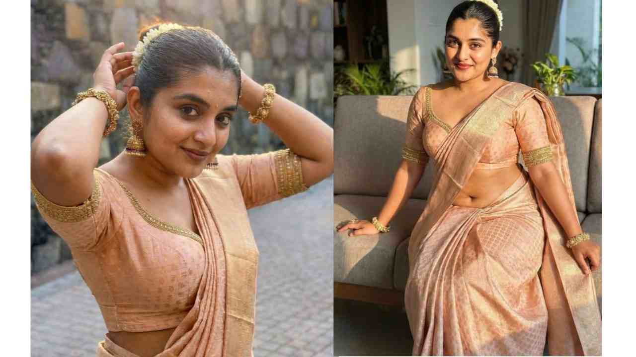 Nivetha thomas chubby navel & thoppul exposed in saree..