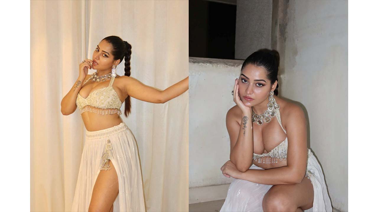 Simran kaur spicy cleavage and navel exposed in bikini top..